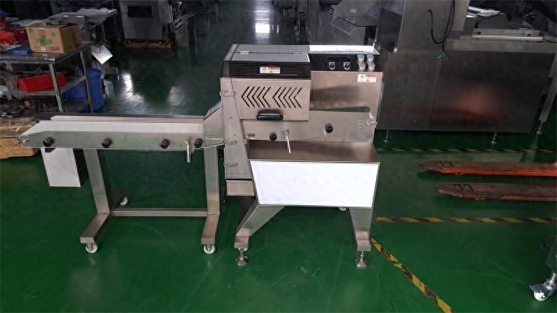 鹵肉切塊機(jī)能給豬牛肉、牛雜、臘腸臘肉等熟肉切片加工